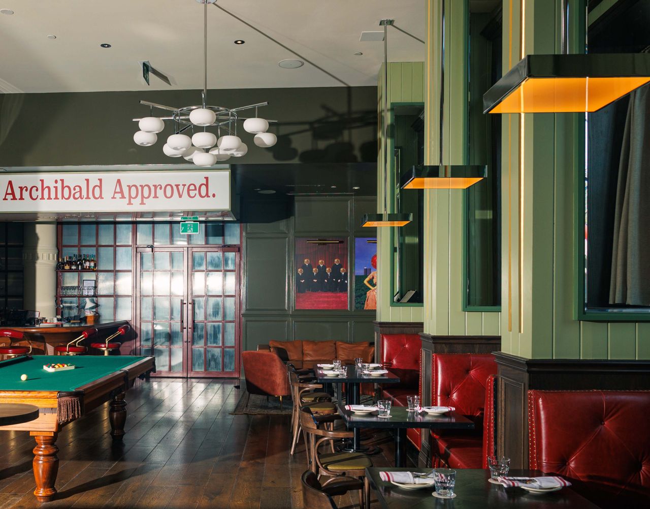 A pool table in the centre of Archie's dining room inside the Broadview Hotel