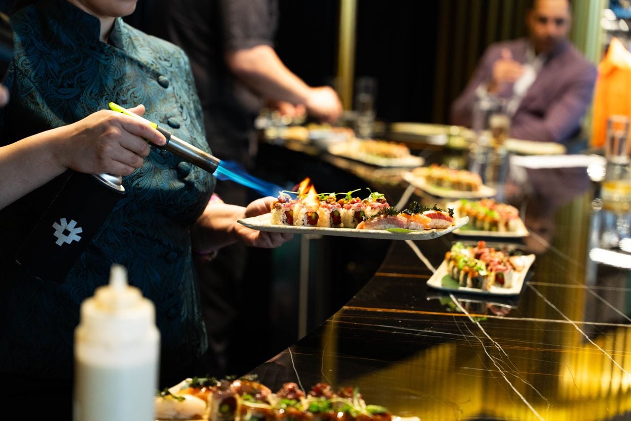 Chefs torch sushi