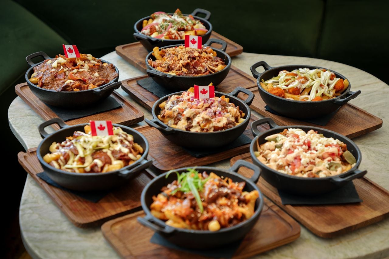 A selection of poutines available at Dia, the restaurant inside Canopy Hilton Toronto Yorkville