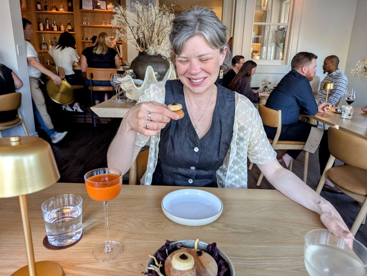 Maddie Calvert-Tarlo with a beaver tail topped with foie gras at Lore Restaurant