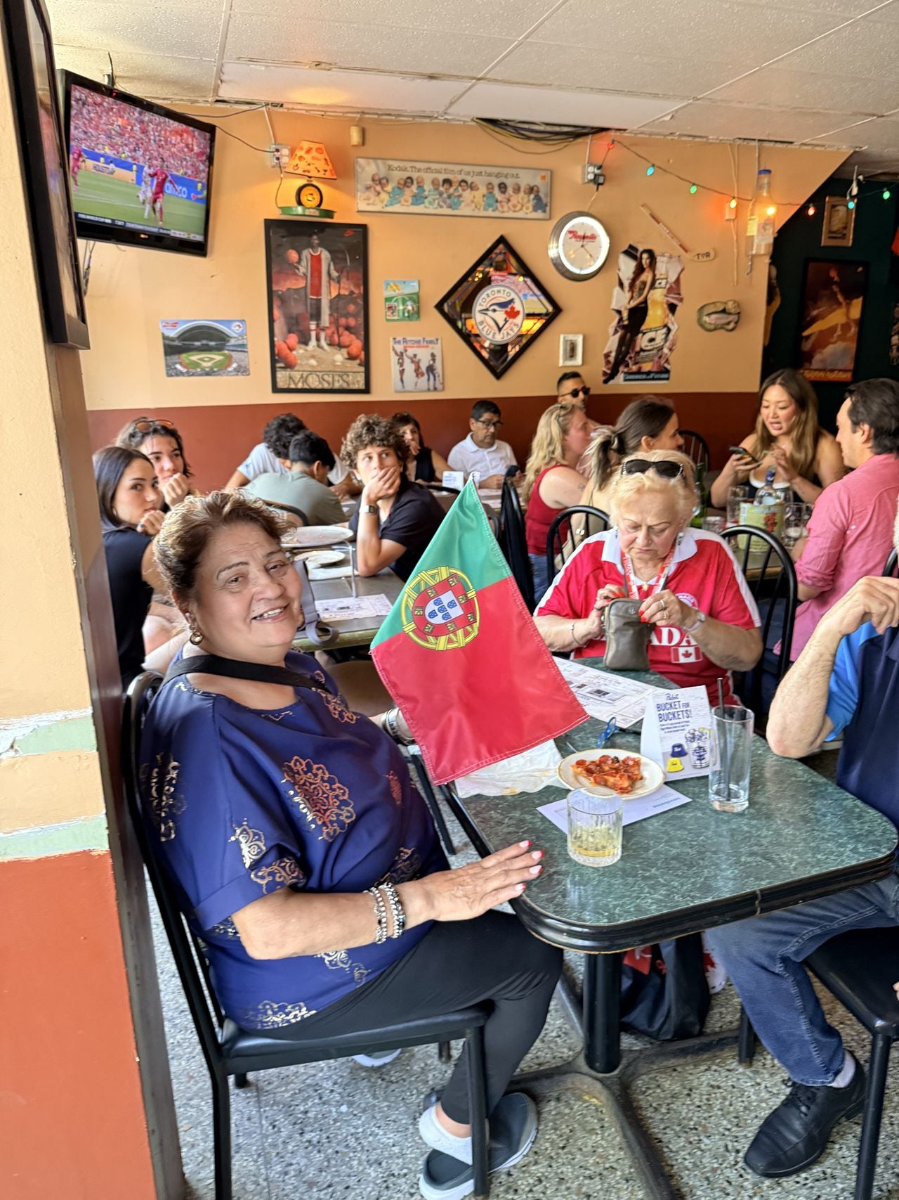 People watch the World Cup at Maria's Sports Bar in Toronto
