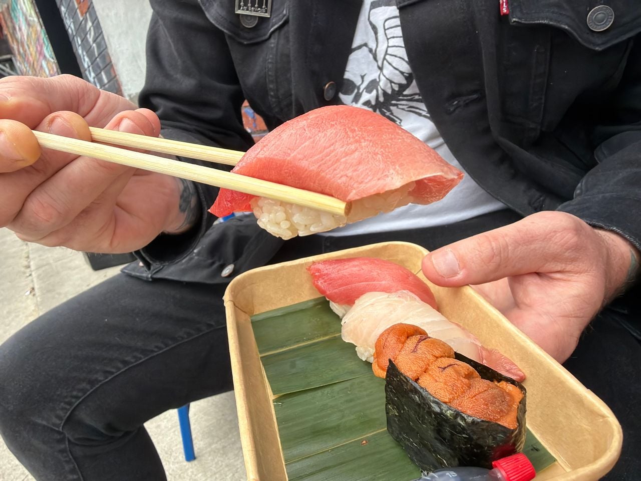 A closeup of some tuna in an order of nigiri