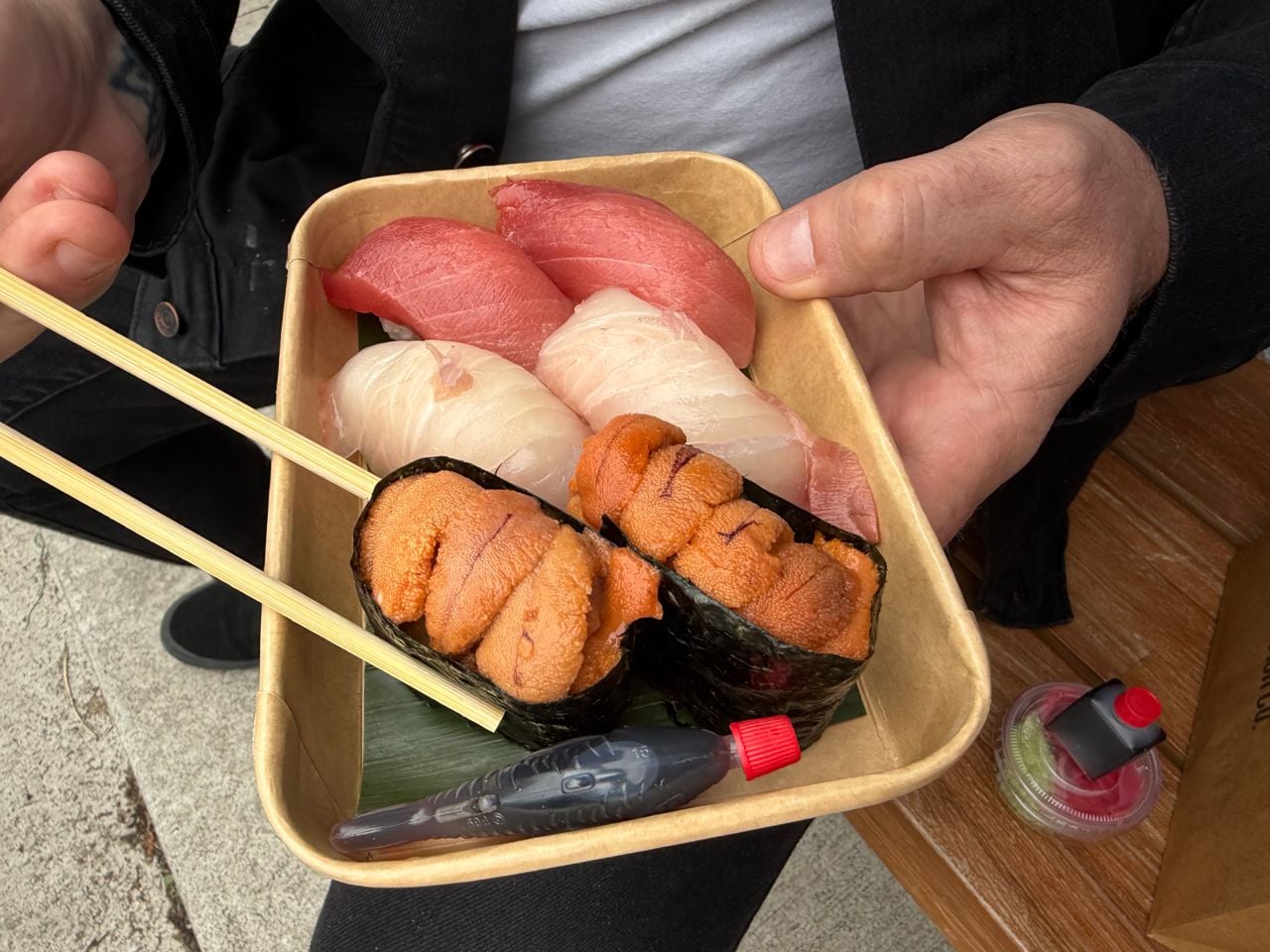 A closeup of some uni in an order of nigiri