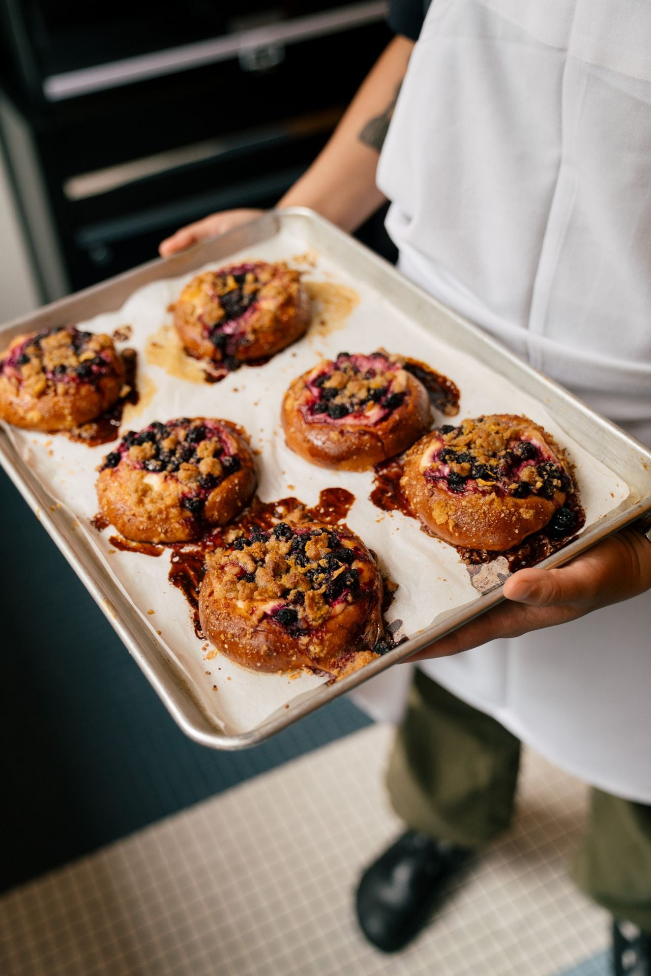 A tray of blueberry buns