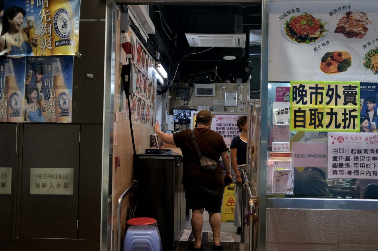 Customers inside Tin Cheun, a food stall in Hong Kong