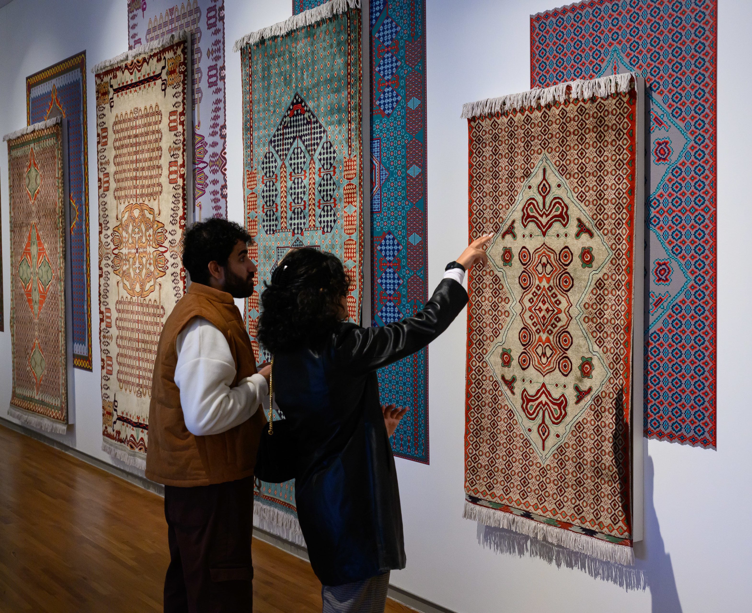 I touch Afghanistan when I touch these carpets