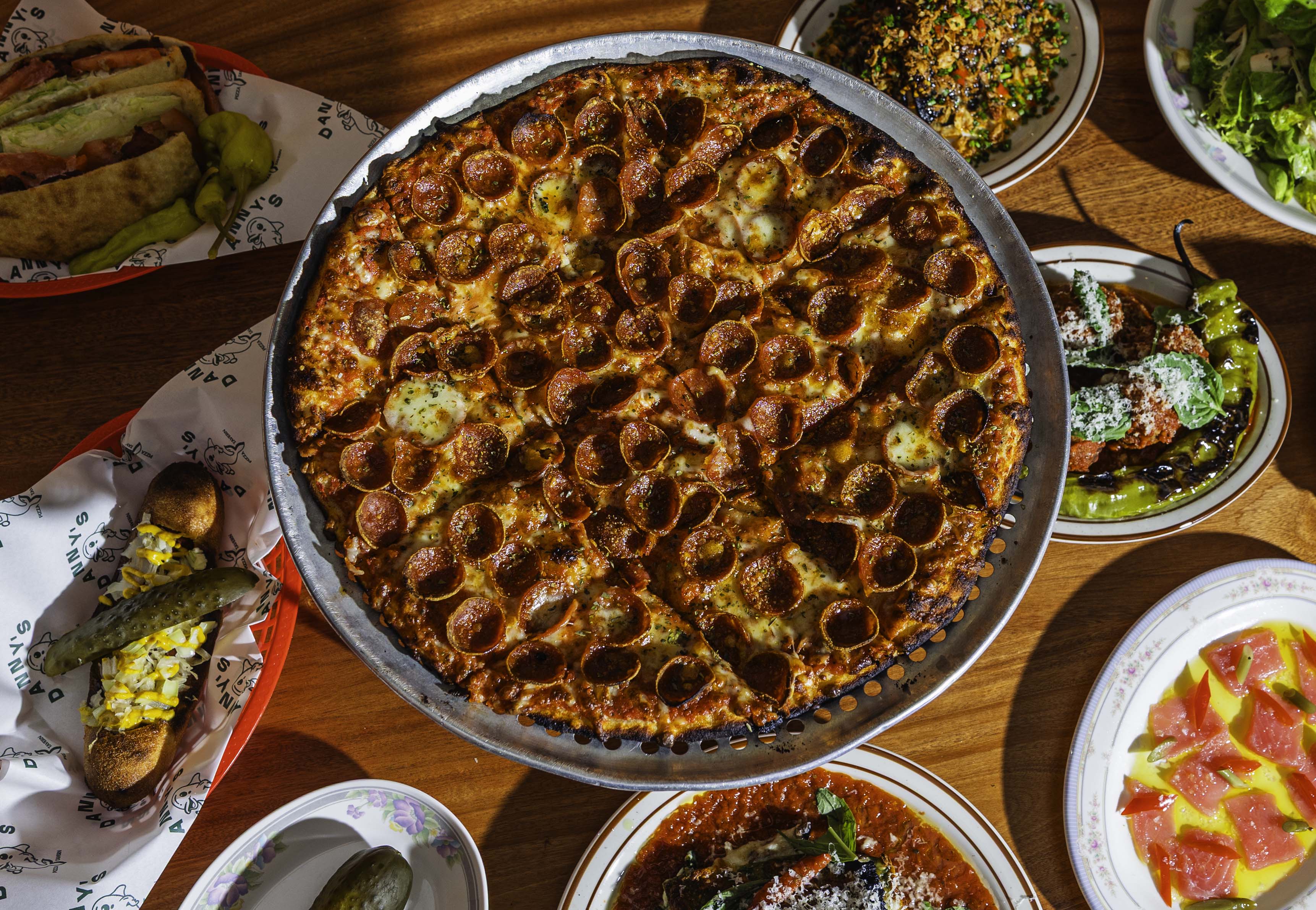 A super-popular pizzeria in Little Italy just opened a bar next