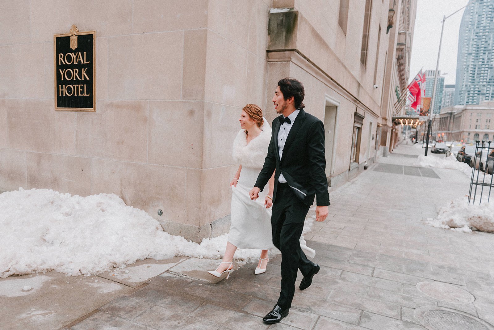 Caroline and Mauricio walking outside