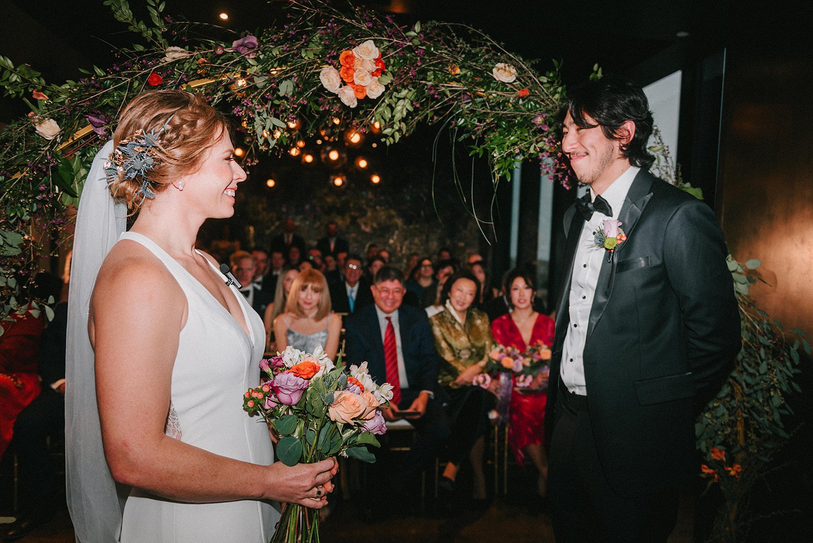Caroline and Mauricio at the altar at their wedding