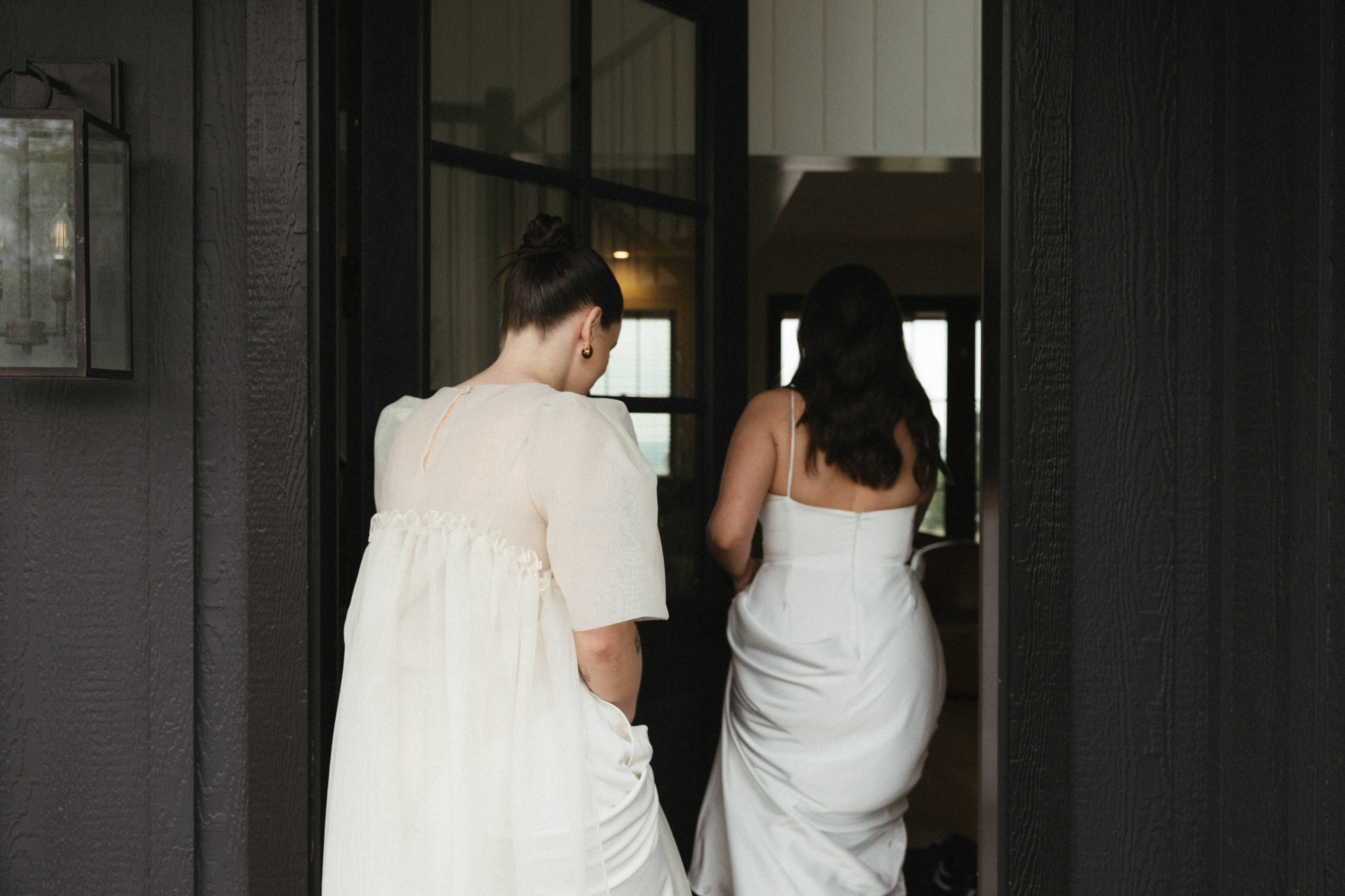 Two brides from the back.