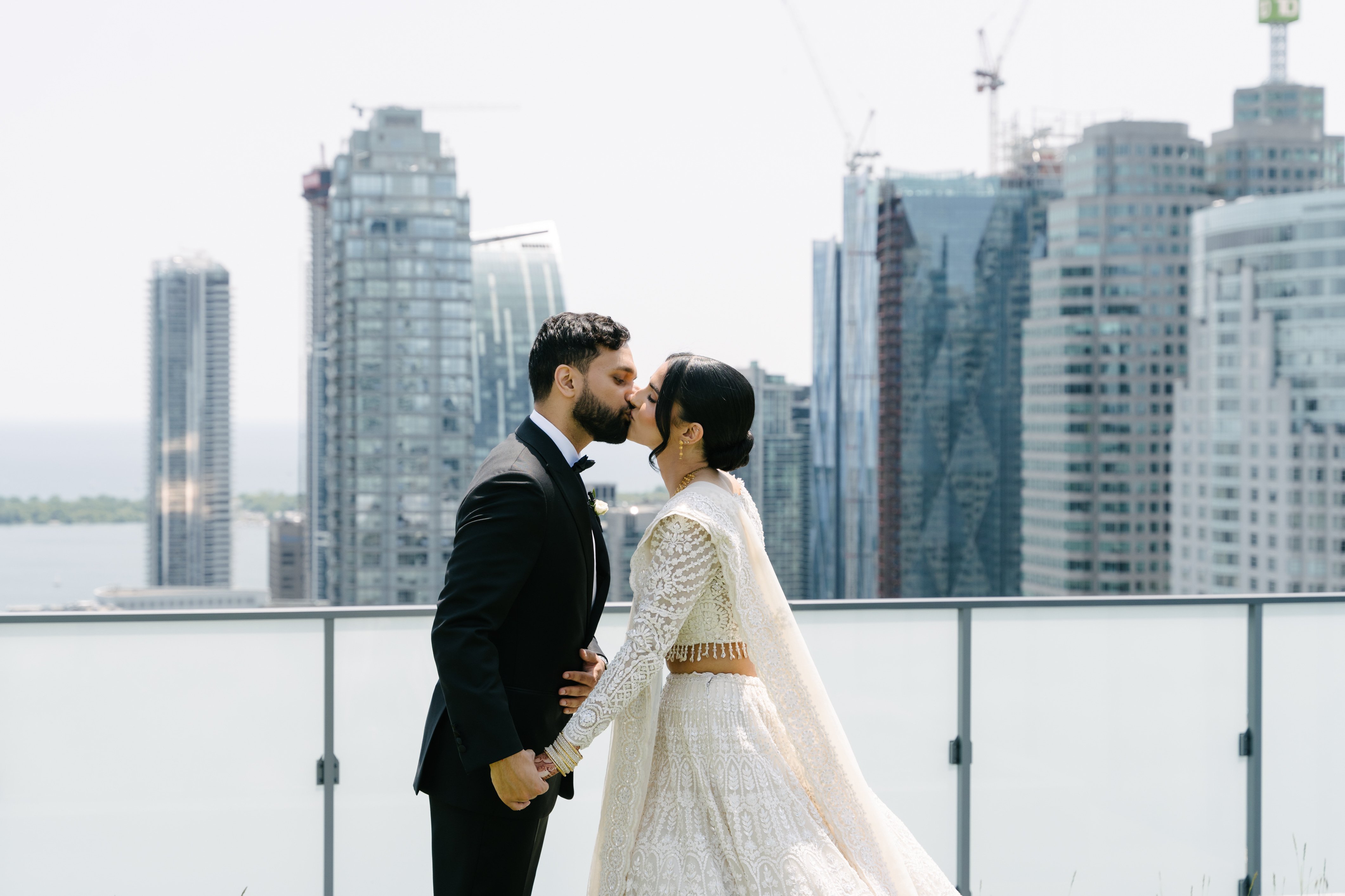 Bride and groom kissing