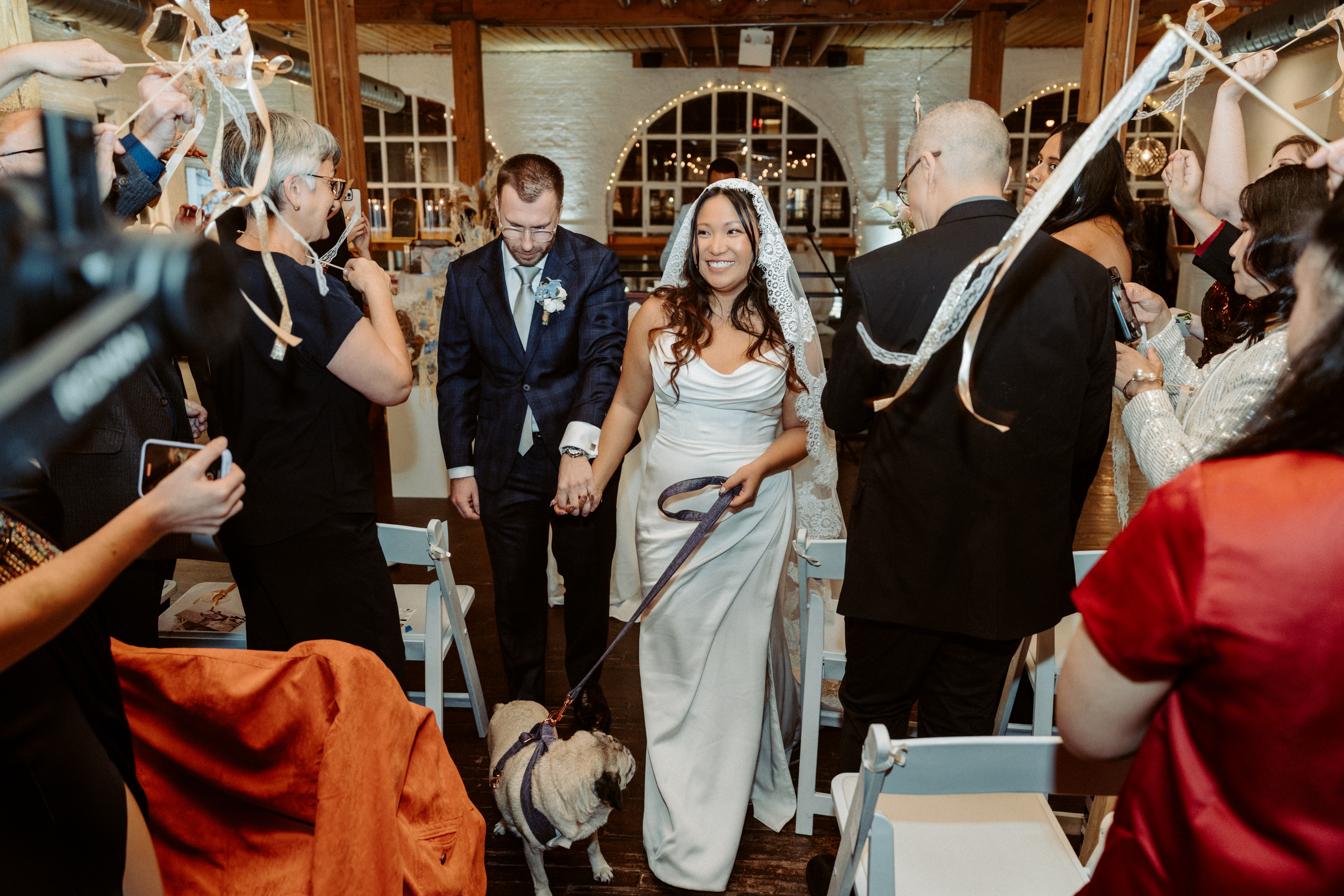 Bride and groom walking down aisle