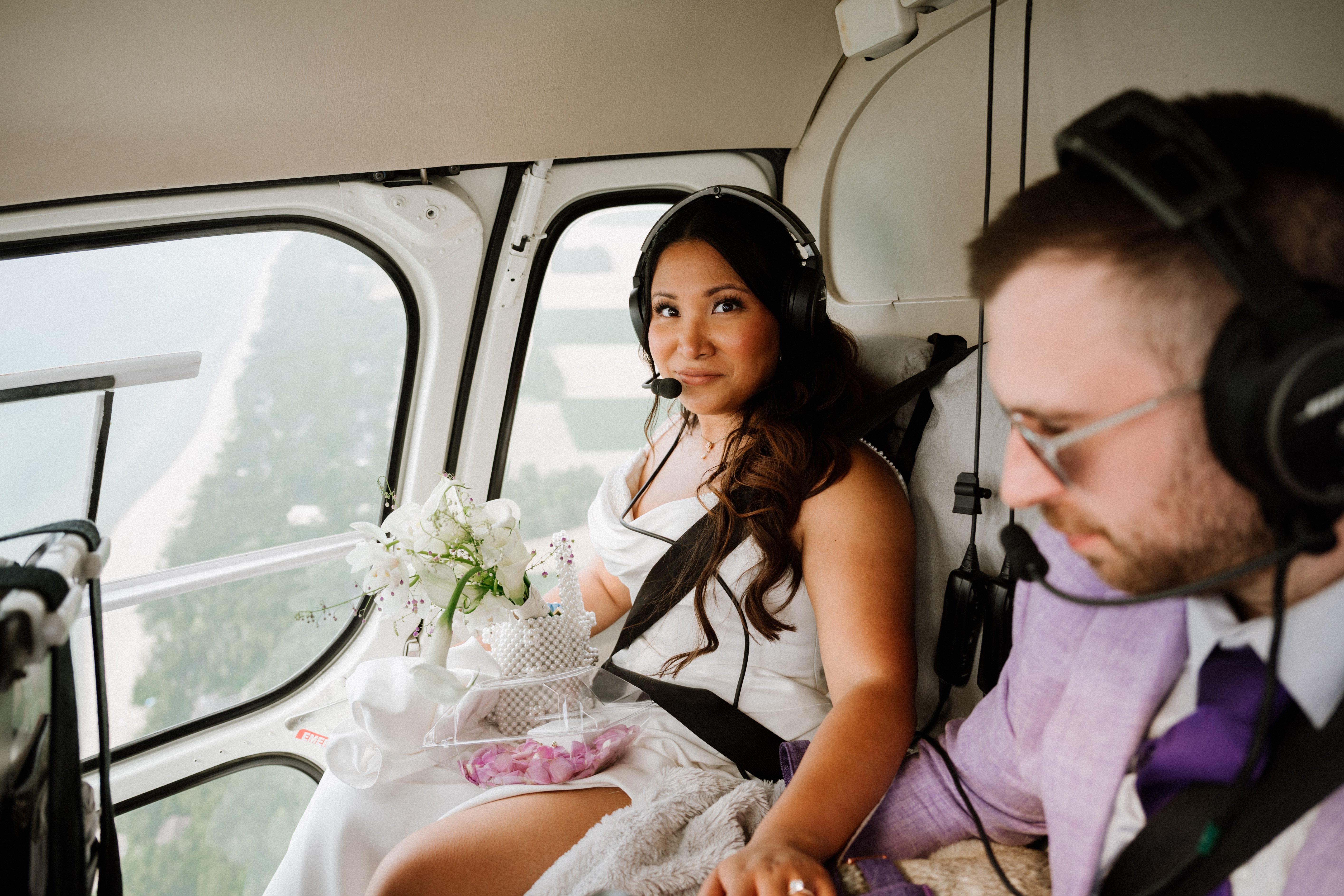Bride and groom in a helicopter