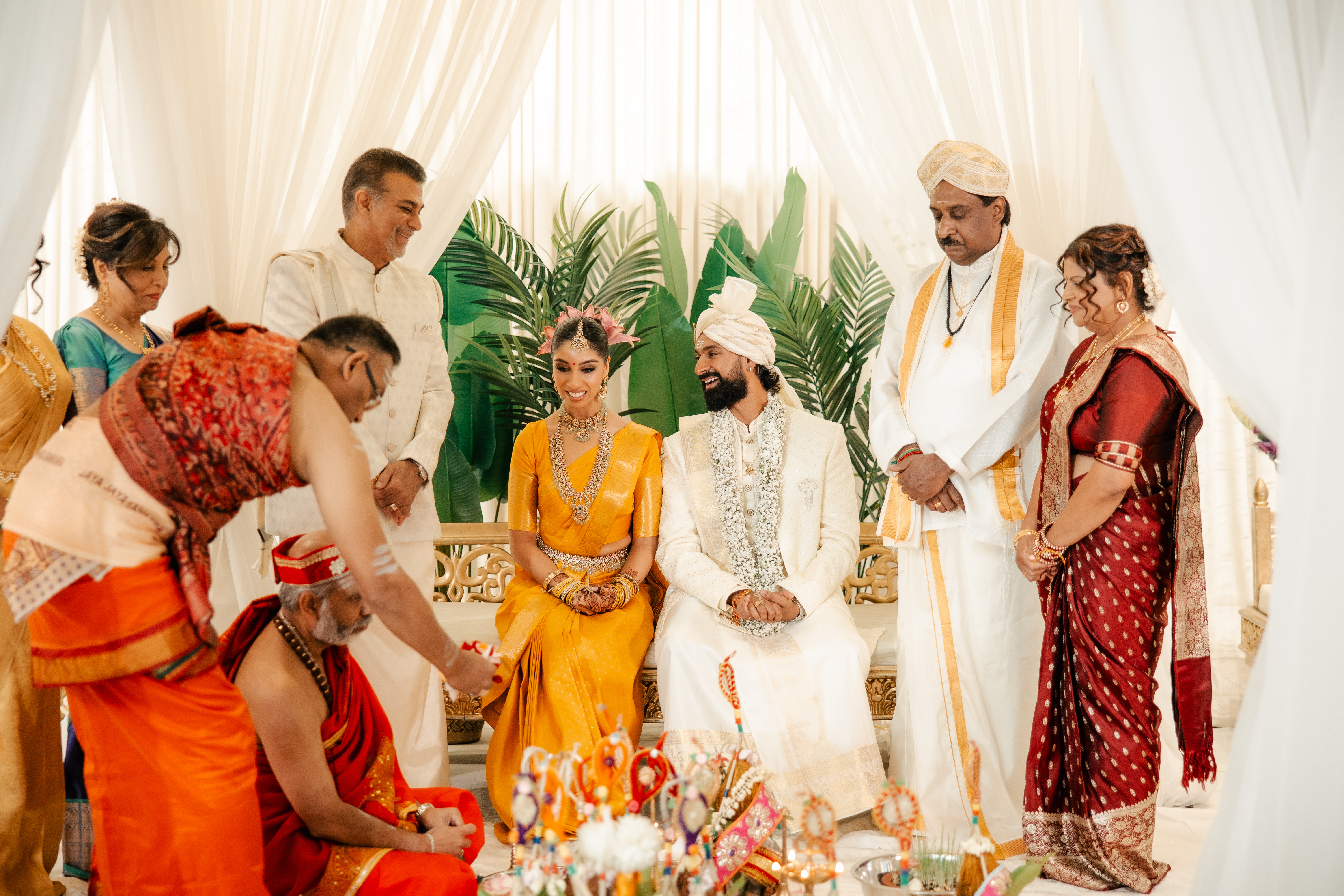 Bride and groom sitting and smiling
