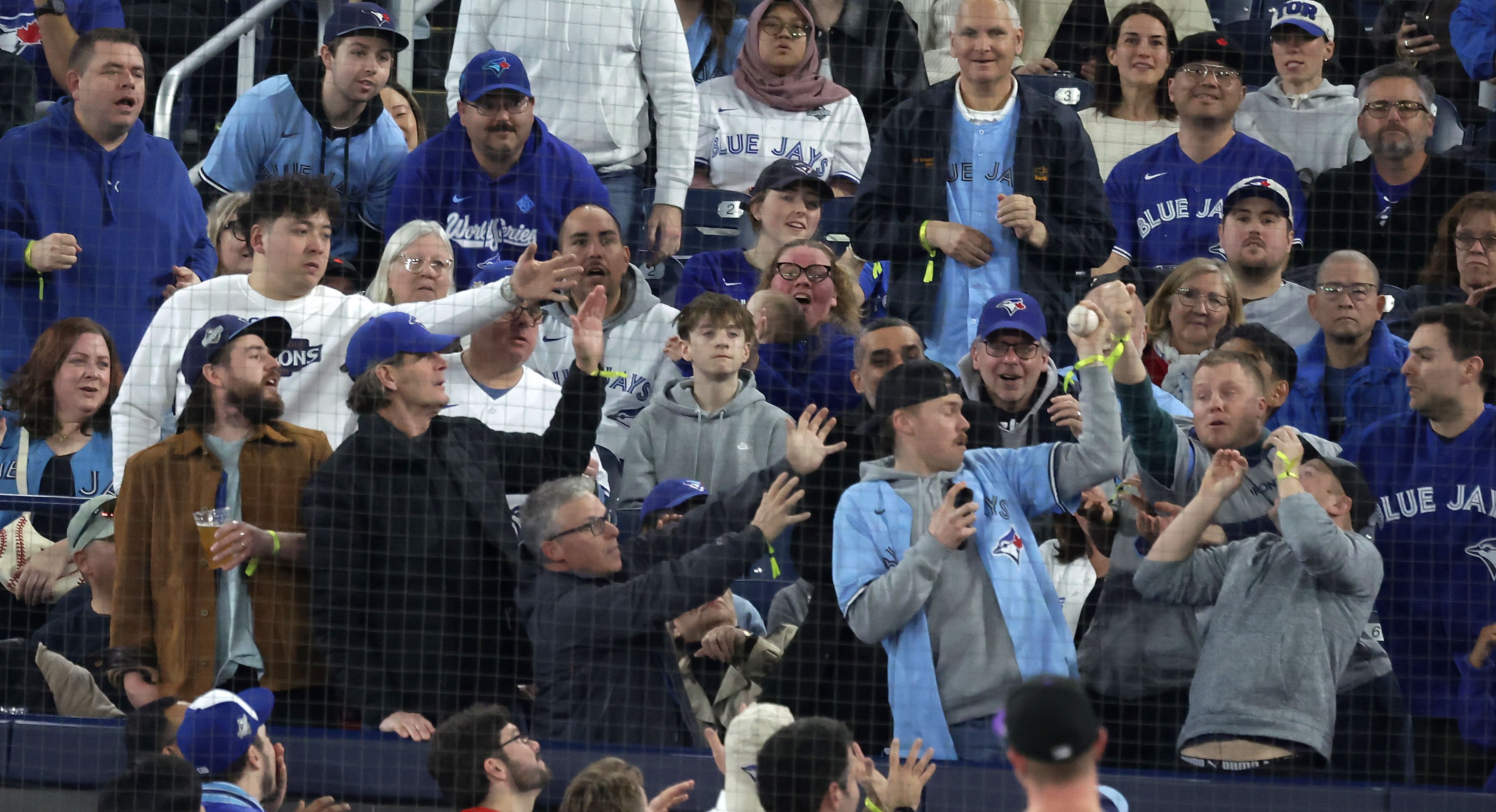 Polymarket isn’t legal in Ontario. How did its flyers end up circulating at a Jays game?