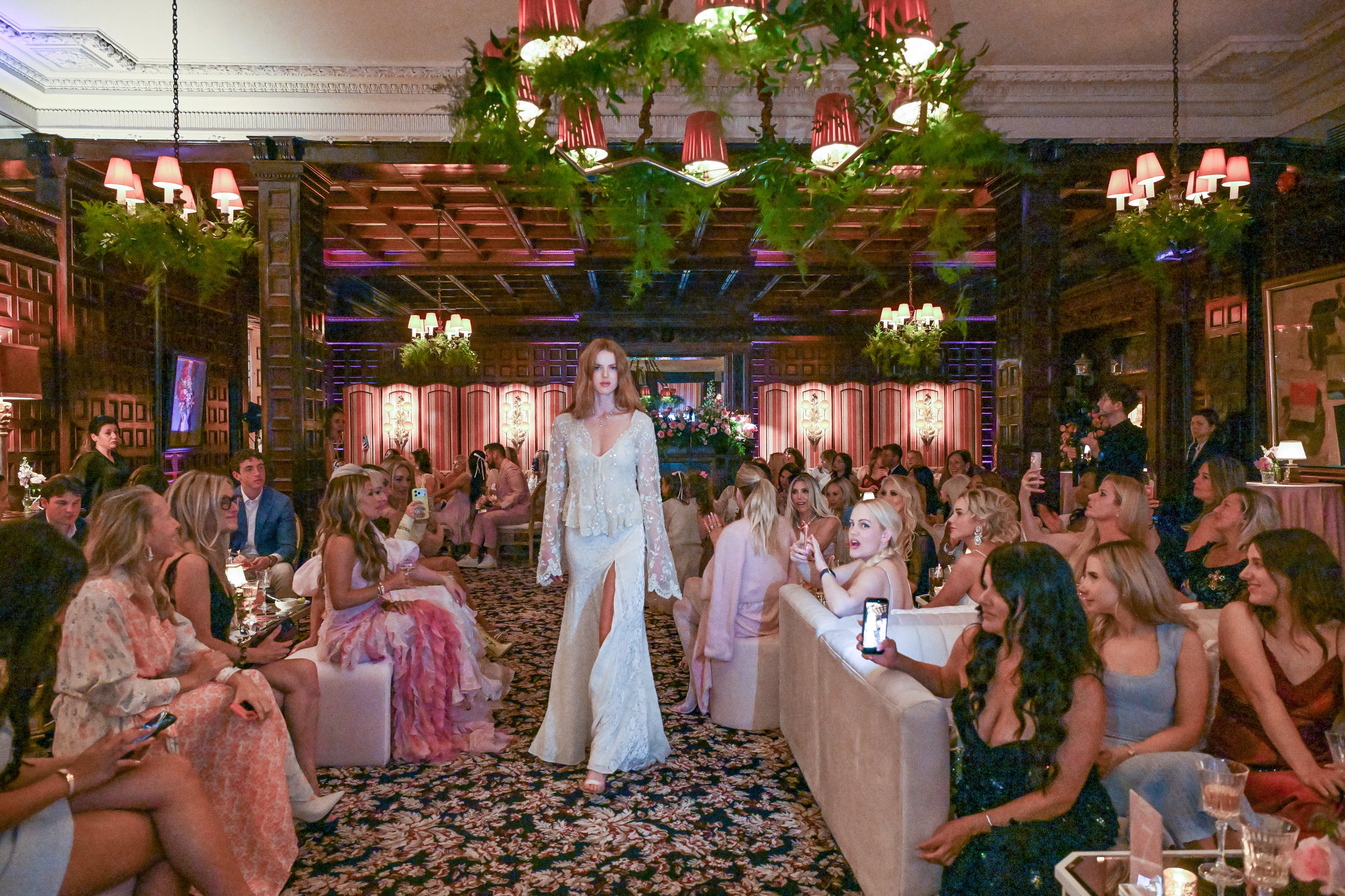 What went down at a frilly fashion show hosted by Suzanne Rogers
